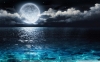 A hold és az óceán fotó poszter